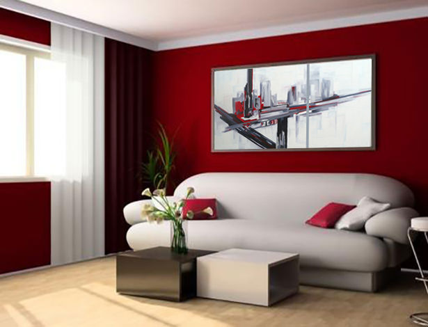 Un cuadro en la pared de un dormitorio con un cuadro rojo y blanco encima.